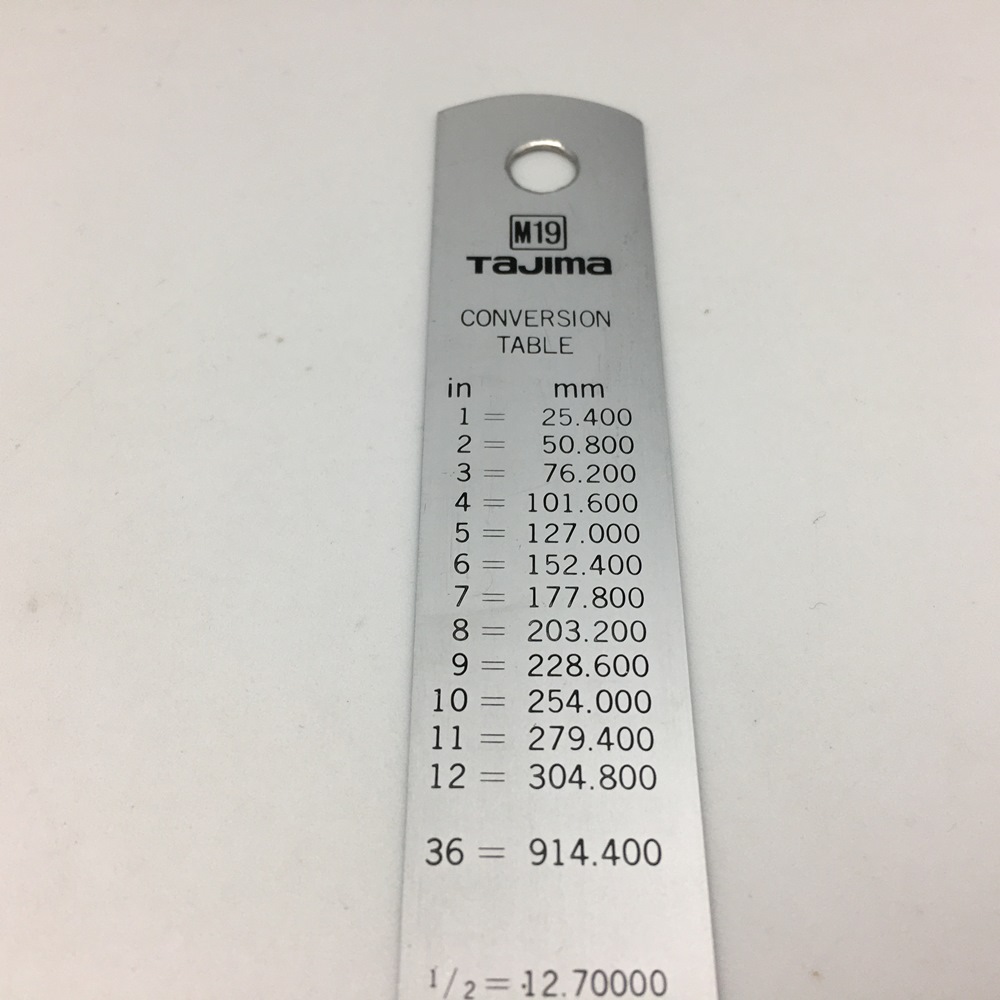 Линейка стальная Tajima 30 см