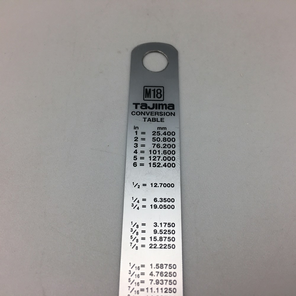 Линейка стальная Tajima 15 см
